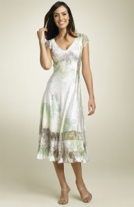 lace-insets Lace insets give this a demure wedding feel, but the silky fabric keeps it casual.