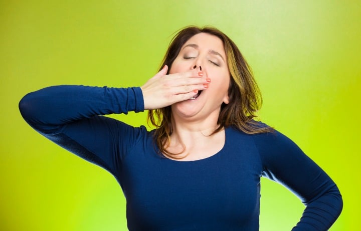 bored woman yawning