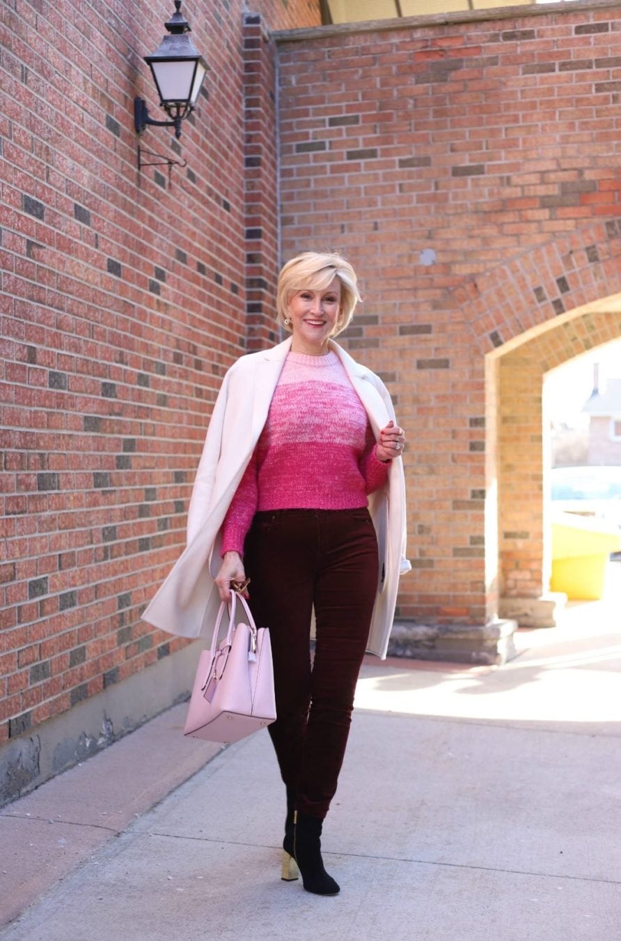 pink ombre sweater, burgundy velvet jeans, white coat