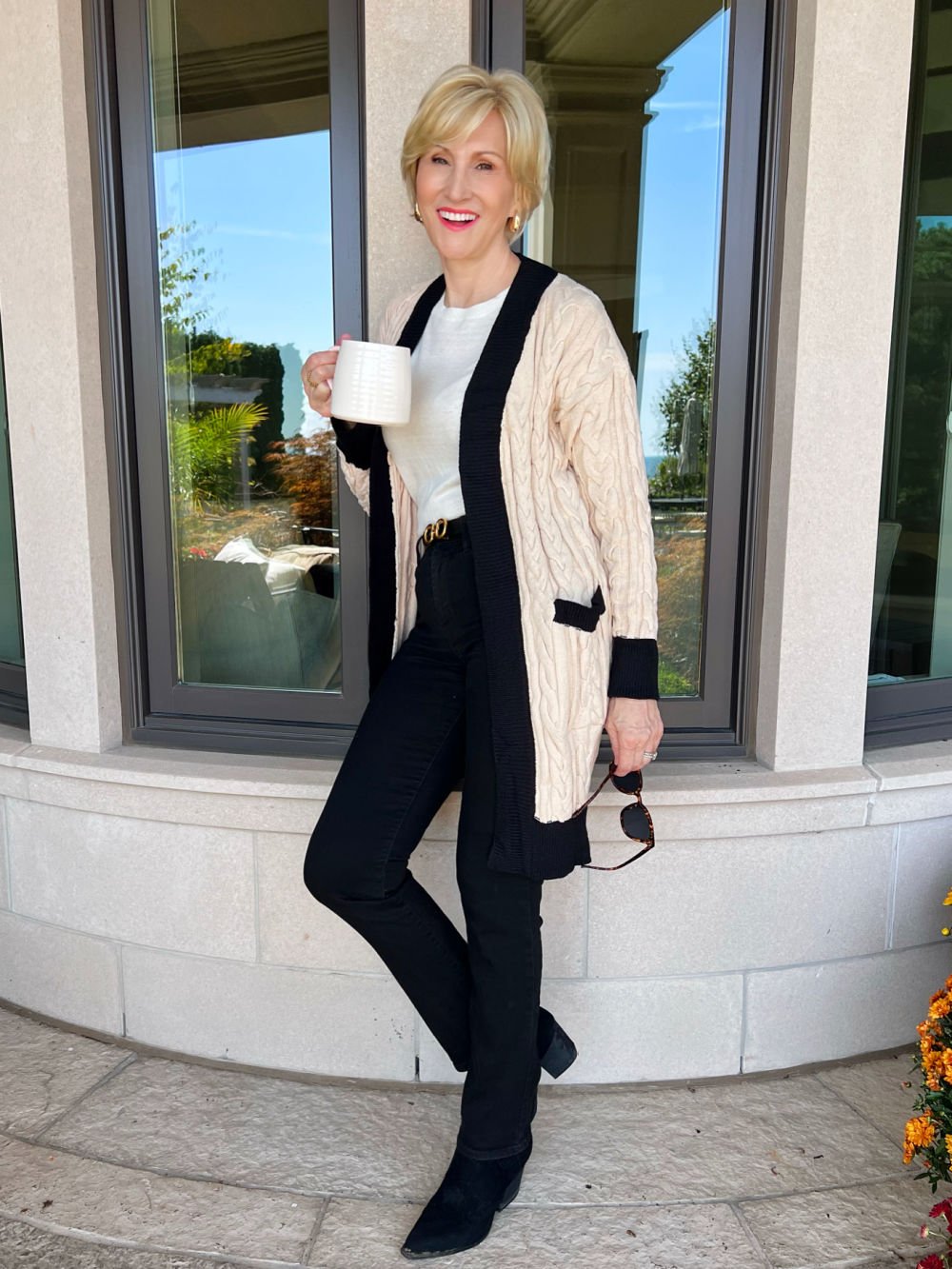 chunky cableknit cardigan with vertical trim