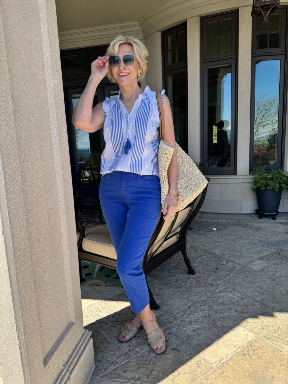 blue cropped pants and blue and white sleeveless top