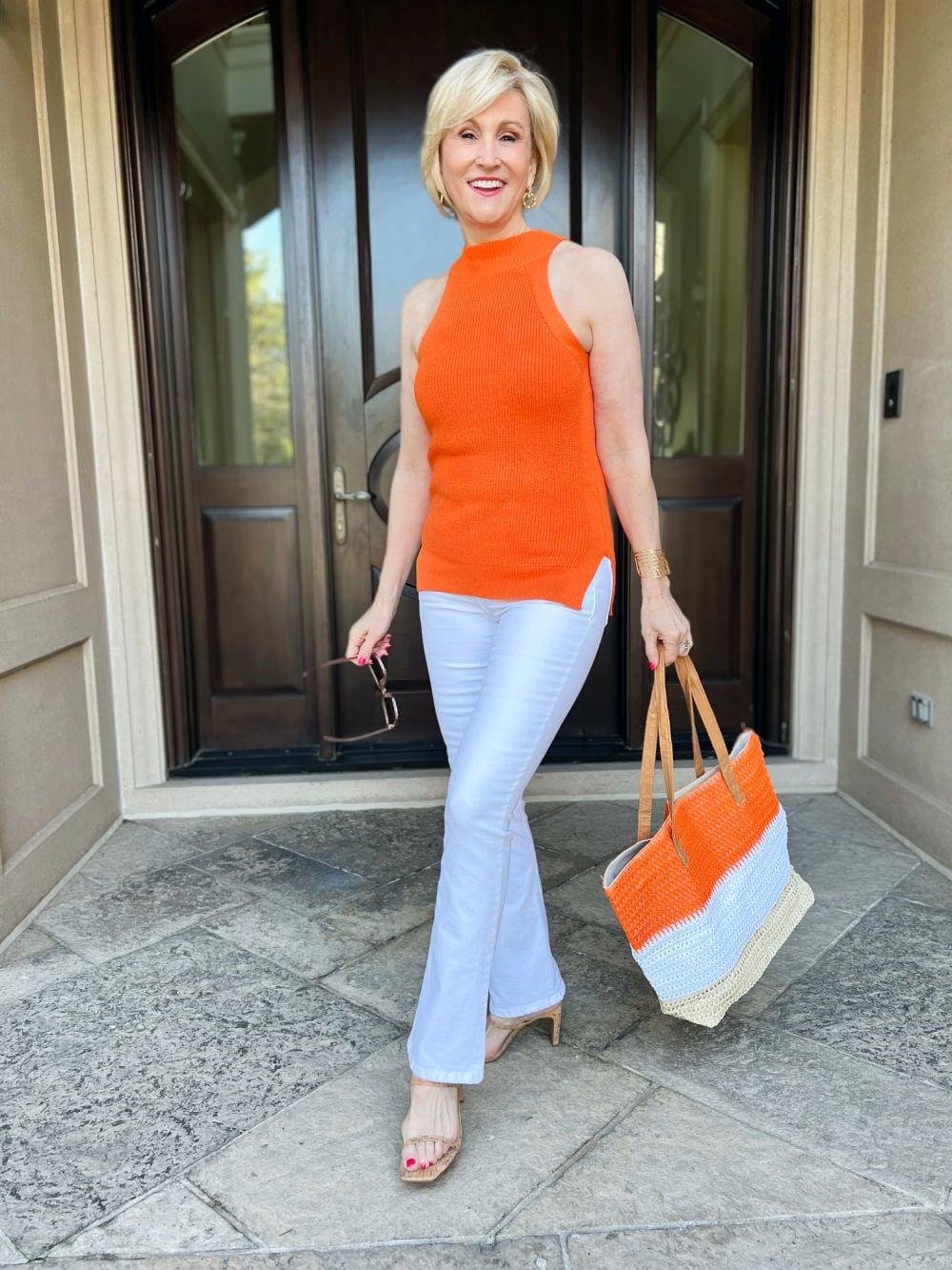 WOMAN WEARING A FLATTERING SHADE FOR HER SKIN TONE COMPLEXION HAIR