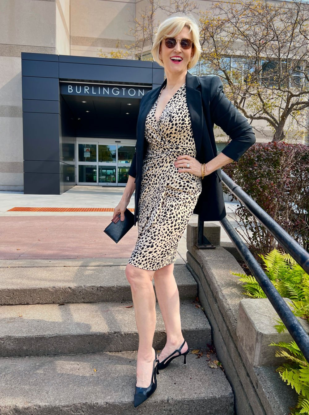 how to layer jackets sweaters over dresses for fall 2025