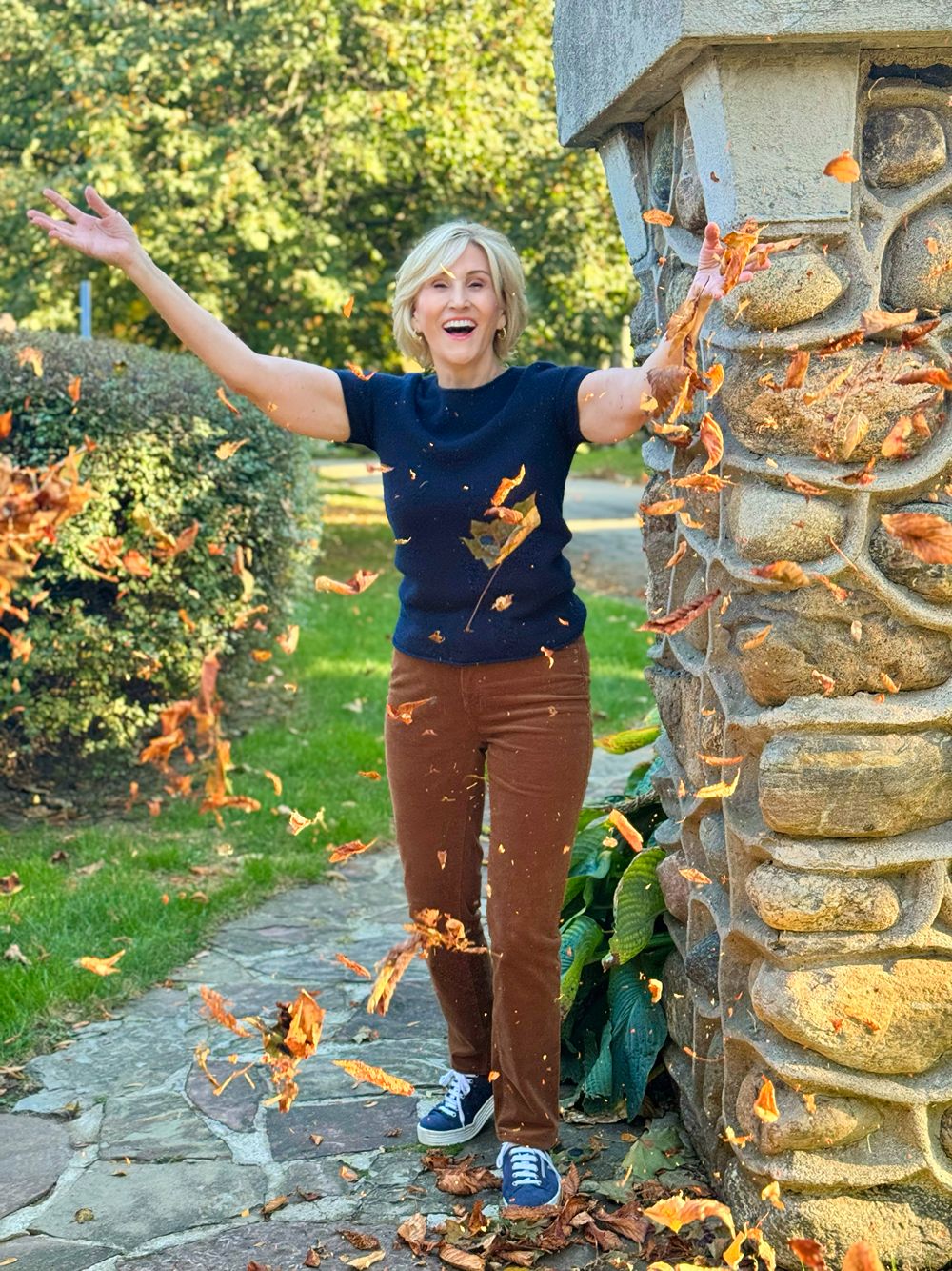 brown straight leg cords, blue cashemere top, blue sneakers