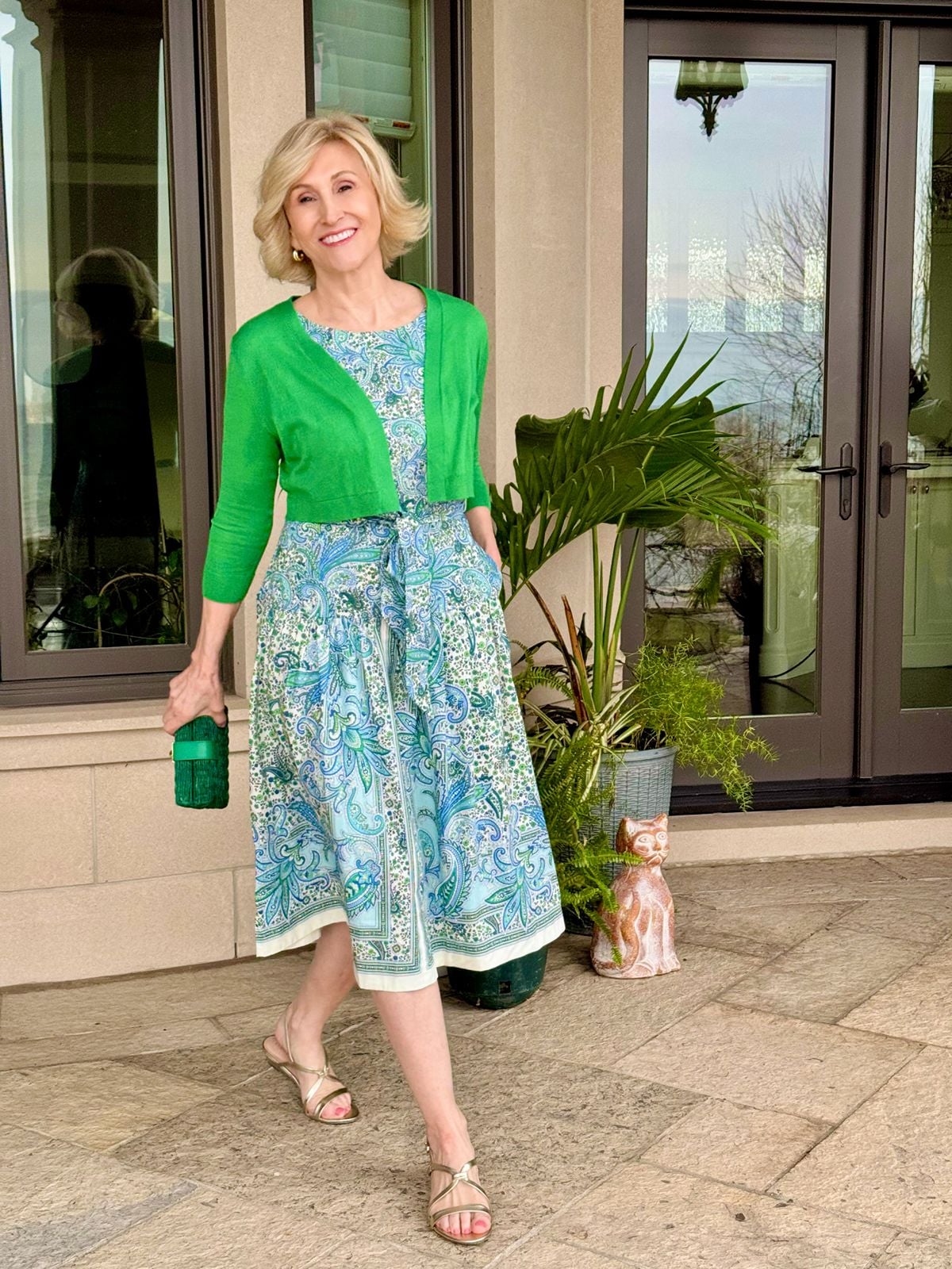 green shrug with dress