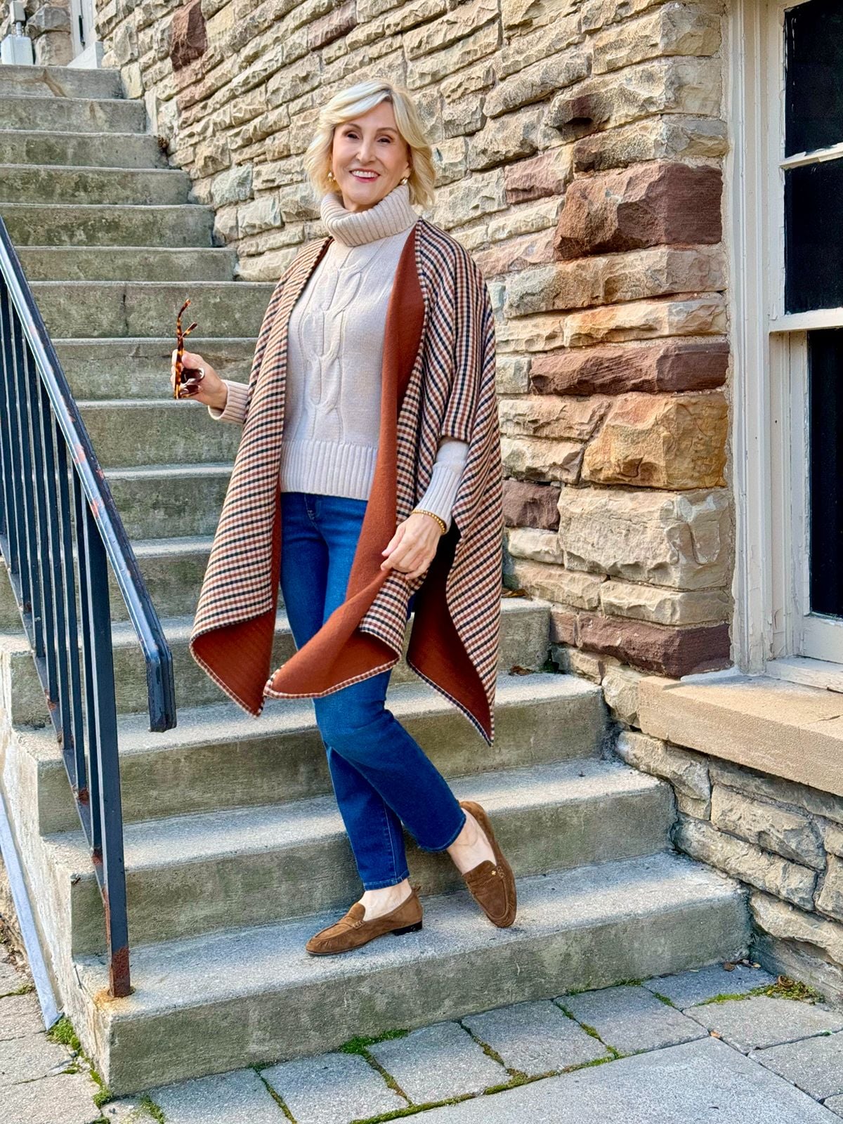 plaid cape with turtleneck jeans